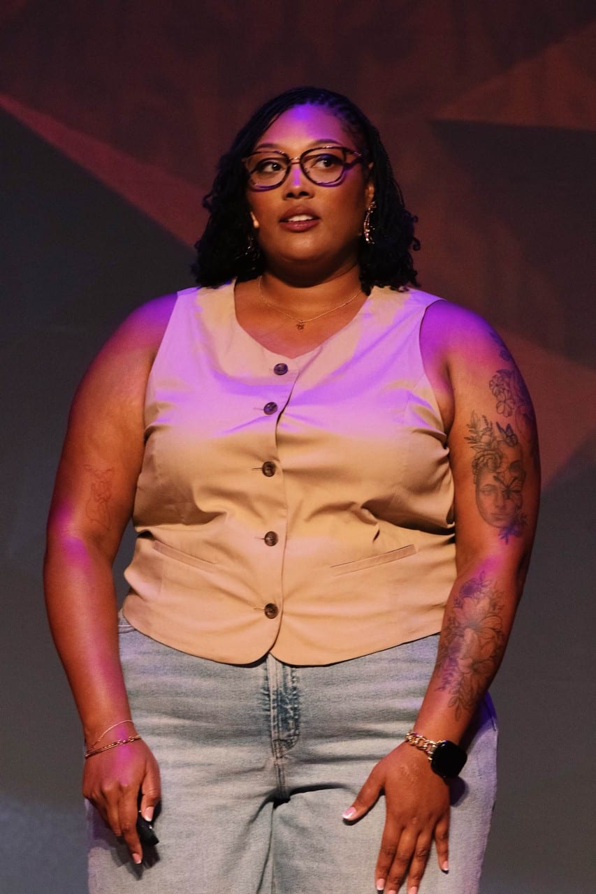 Jalonni Weaver on stage as a creator and speaker on personal branding and intrapreneurship